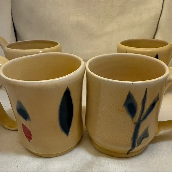4/ studio art mugs. Tan with Black and Red Accents - Picture 2 of 5